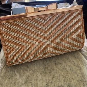 Rose gold and champagne rhinestone clutch